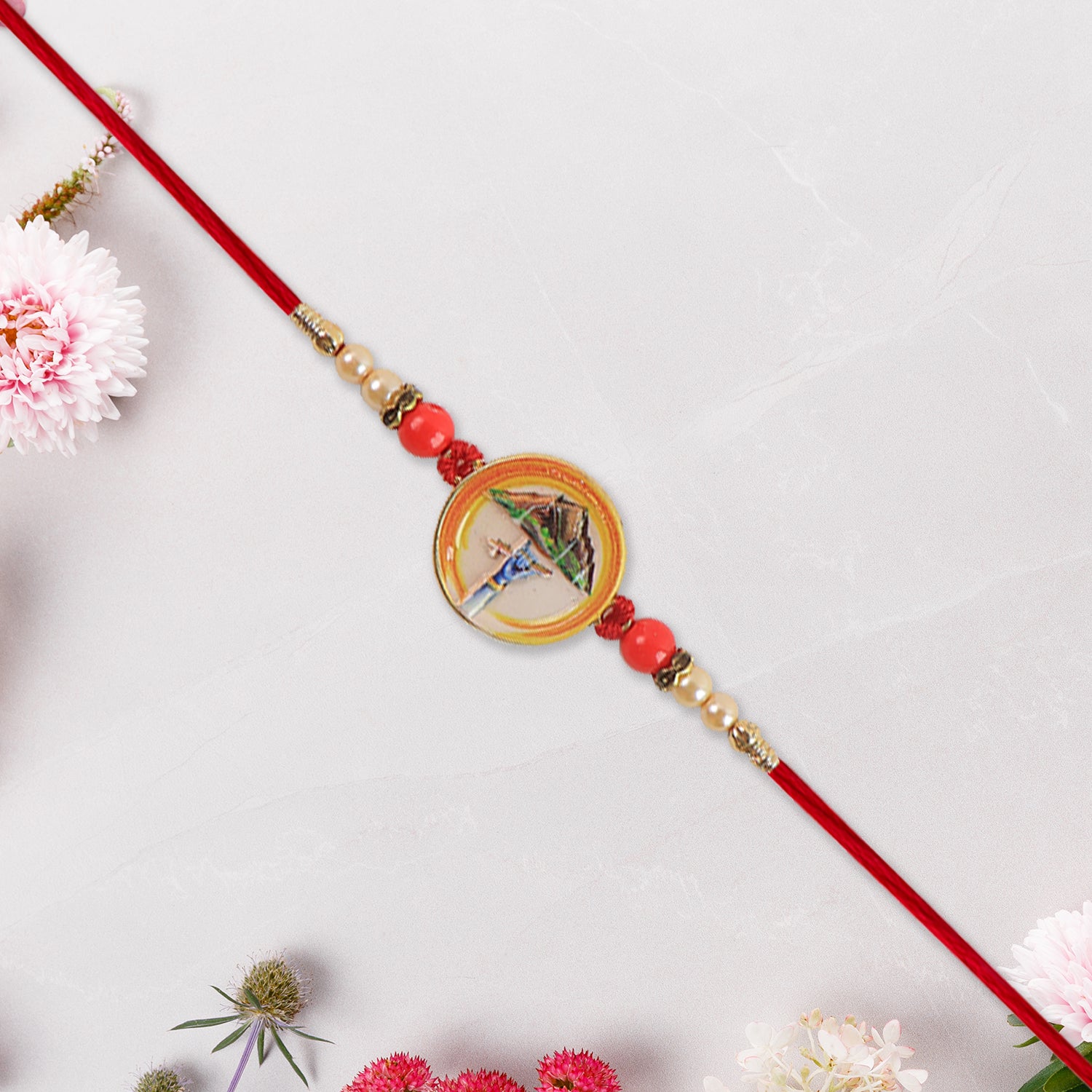 Divine Krishna Govardhan Parvat Rakhi With Pearl  Mauli Thread Divine Krishna Govardhan Parvat Rakhi With Pearl  Mauli Thread